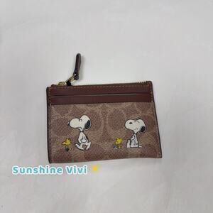 NWT Coach X Peanuts Mini Skinny Id Case In Signature With Snoopy Print CBT14
